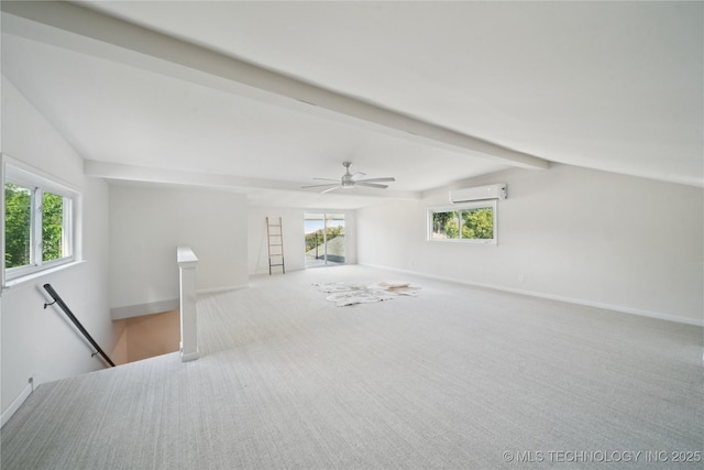 3919 S Detroit Ave, Tulsa, OK 74105 - unfurnished living room with an AC wall unit, plenty of natural light, carpet floors, and ceiling fan