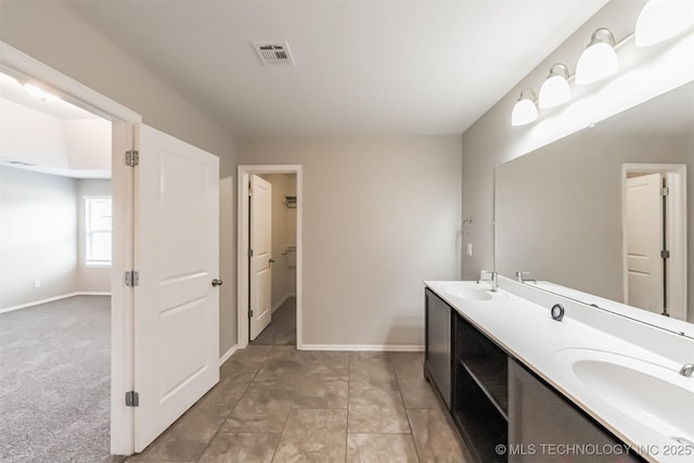 17409 E 44th St S, Tulsa, OK 74134 - full bathroom with double vanity and baseboards