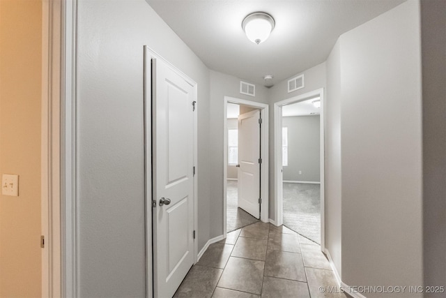 17409 E 44th St S, Tulsa, OK 74134 - hall featuring tile patterned flooring and baseboards