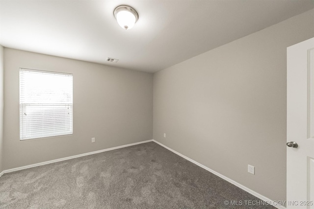 17409 E 44th St S, Tulsa, OK 74134 - empty room with dark colored carpet and baseboards