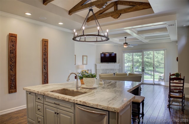 4401 S Yellow Pine Ave, Broken Arrow, OK 74011 - kitchen featuring dishwasher, ceiling fan, beamed ceiling, a kitchen island with sink, and light stone countertops