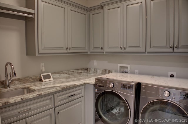 4401 S Yellow Pine Ave, Broken Arrow, OK 74011 - laundry area featuring independent washer and dryer and cabinet space