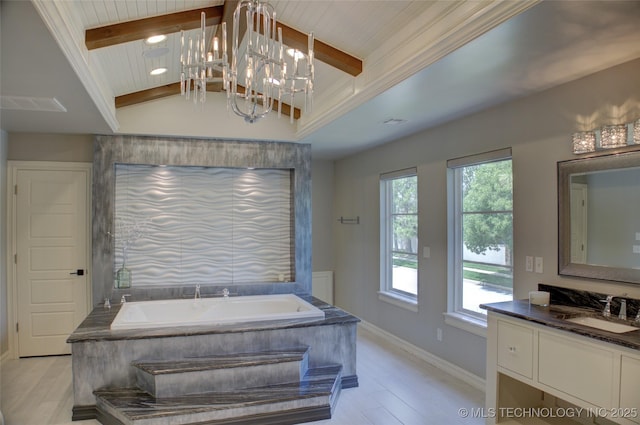 4401 S Yellow Pine Ave, Broken Arrow, OK 74011 - full bath with vanity, a bath, wood finished floors, and a chandelier