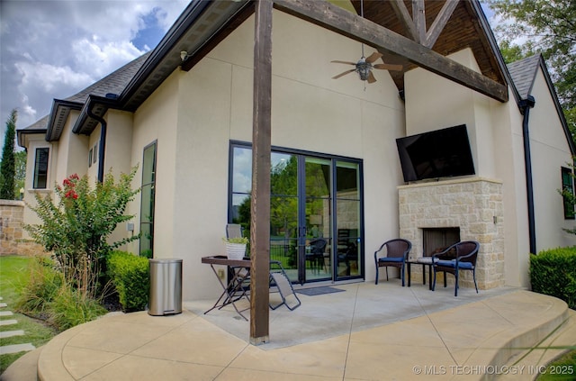 4401 S Yellow Pine Ave, Broken Arrow, OK 74011 - view of patio with an outdoor stone fireplace and ceiling fan