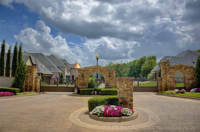 4401 S Yellow Pine Ave, Broken Arrow, OK 74011 - community sign with a gate and curved driveway