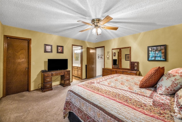 9601 Spring Lake Dr, Broken Arrow, OK 74014 - bedroom with light carpet, a textured ceiling, ensuite bathroom, and a ceiling fan