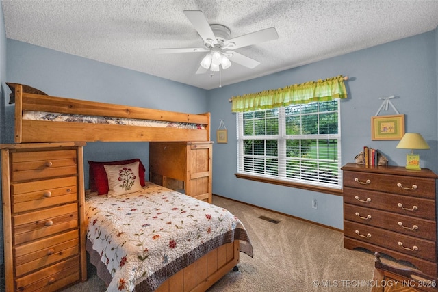 9601 Spring Lake Dr, Broken Arrow, OK 74014 - bedroom with carpet floors, a textured ceiling, and a ceiling fan