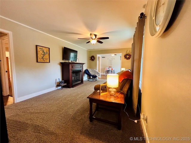 401 High St, Eufaula, OK 74432 - carpeted living room featuring a ceiling fan and a fireplace