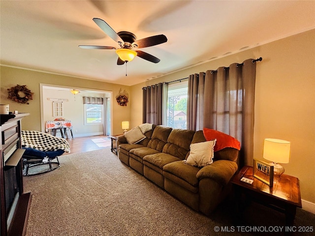 401 High St, Eufaula, OK 74432 - living room with ceiling fan and carpet flooring
