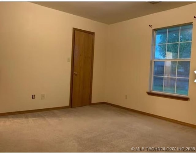 9375 E 530th Rd, Claremore, OK 74019 - unfurnished room with carpet flooring and baseboards