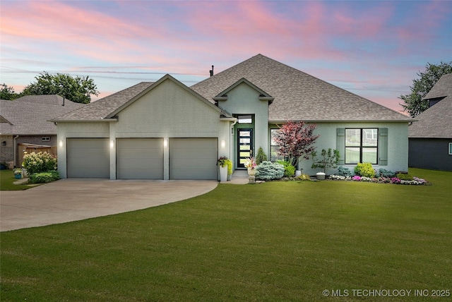 8701 E Hartford St, Broken Arrow, OK 74014 - view of front of house with a shingled roof, an attached garage, driveway, and a yard