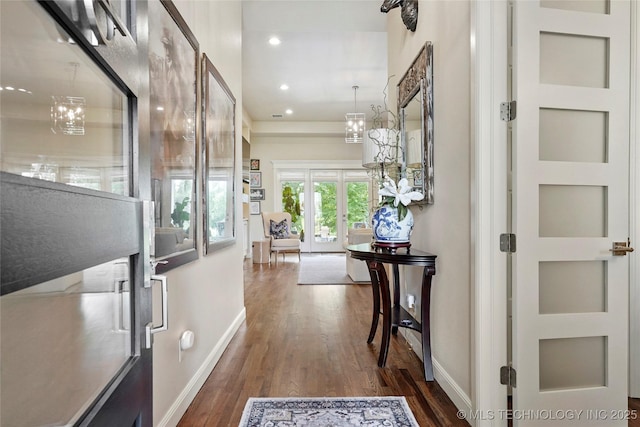 8701 E Hartford St, Broken Arrow, OK 74014 - entrance foyer with dark wood finished floors, french doors, recessed lighting, and a chandelier