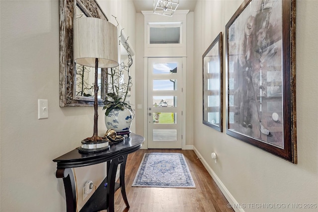 8701 E Hartford St, Broken Arrow, OK 74014 - foyer featuring wood finished floors and baseboards