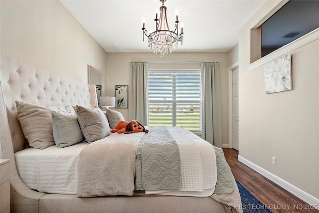 8701 E Hartford St, Broken Arrow, OK 74014 - bedroom with a chandelier and wood finished floors