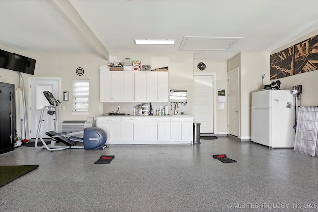 8701 E Hartford St, Broken Arrow, OK 74014 - garage with freestanding refrigerator