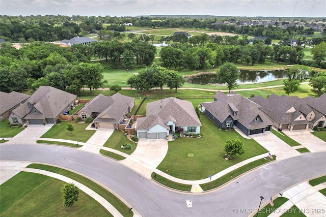 8701 E Hartford St, Broken Arrow, OK 74014 - aerial view of property and surrounding area featuring a large body of water and nearby suburban area
