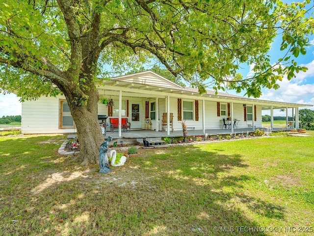 10696 N County Road 3410, Stratford, OK 74872 - view of front of house with covered porch and a front yard