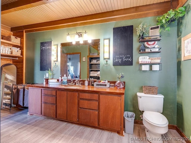 10696 N County Road 3410, Stratford, OK 74872 - bathroom with a wooden ceiling with exposed beams, vanity, and wood finished floors