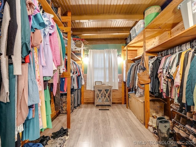 10696 N County Road 3410, Stratford, OK 74872 - spacious closet featuring beamed ceiling and wood finished floors