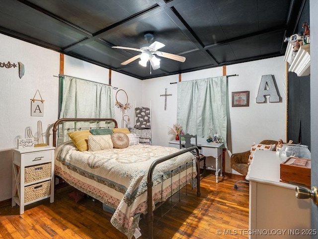 10696 N County Road 3410, Stratford, OK 74872 - bedroom with wood finished floors and a ceiling fan