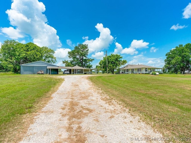 10696 N County Road 3410, Stratford, OK 74872 - single story home with driveway, a front lawn, and a carport