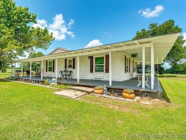 10696 N County Road 3410, Stratford, OK 74872 - view of front of property with covered porch and a front lawn