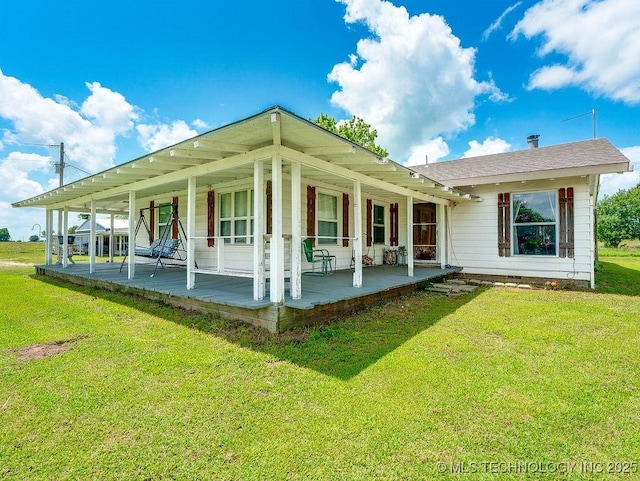 10696 N County Road 3410, Stratford, OK 74872 - view of property exterior with a porch and a yard