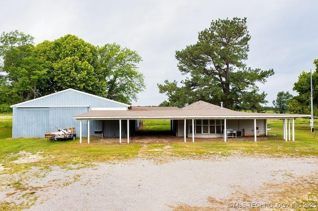 10696 N County Road 3410, Stratford, OK 74872 - garage with a carport