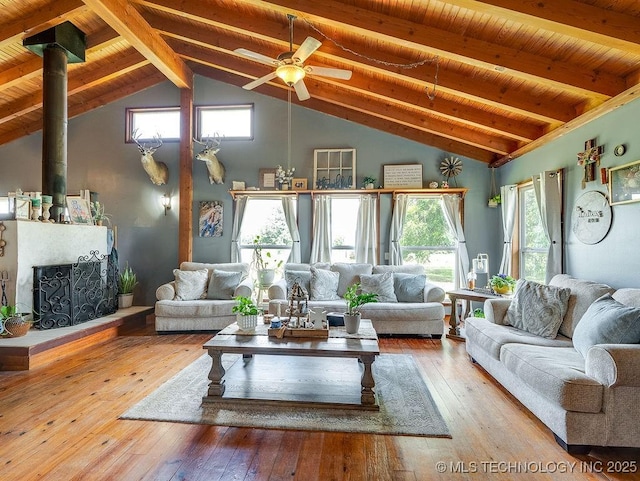 10696 N County Road 3410, Stratford, OK 74872 - living area with hardwood / wood-style flooring, ceiling fan, healthy amount of natural light, and wood ceiling
