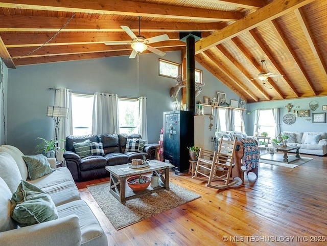 10696 N County Road 3410, Stratford, OK 74872 - living area with a ceiling fan, a wooden ceiling with exposed beams, healthy amount of natural light, light wood-type flooring, and high vaulted ceiling