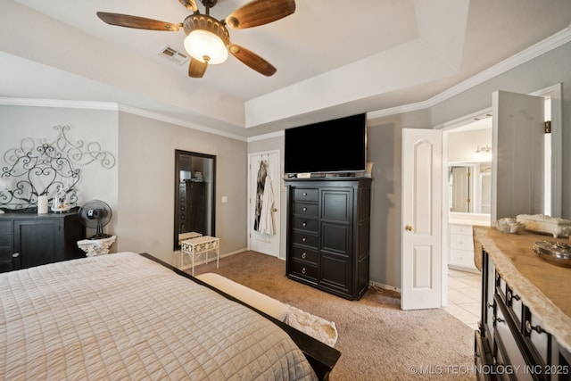 13605 E 90th Ct, Owasso, OK 74055 - bedroom featuring a raised ceiling, light carpet, ensuite bathroom, ceiling fan, and crown molding