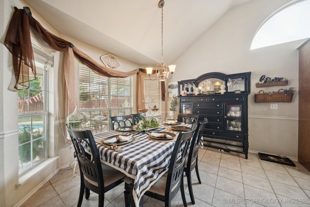 13605 E 90th Ct, Owasso, OK 74055 - dining area featuring vaulted ceiling, a chandelier, and light tile patterned floors