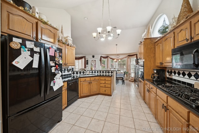 13605 E 90th Ct, Owasso, OK 74055 - kitchen featuring black appliances, a peninsula, a chandelier, backsplash, and light tile patterned floors