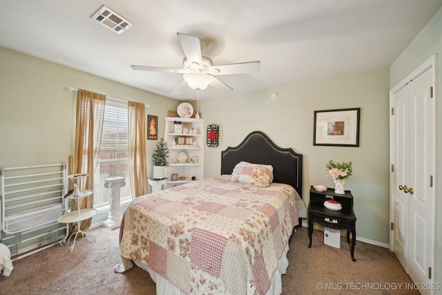 13605 E 90th Ct, Owasso, OK 74055 - bedroom featuring carpet flooring, a ceiling fan, and a closet