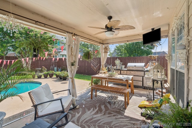 13605 E 90th Ct, Owasso, OK 74055 - fenced backyard featuring a ceiling fan, a patio area, and area for grilling