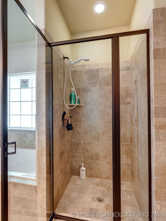 1125 Emily Ln, Ada, OK 74820 - full bathroom with a shower stall and a bath