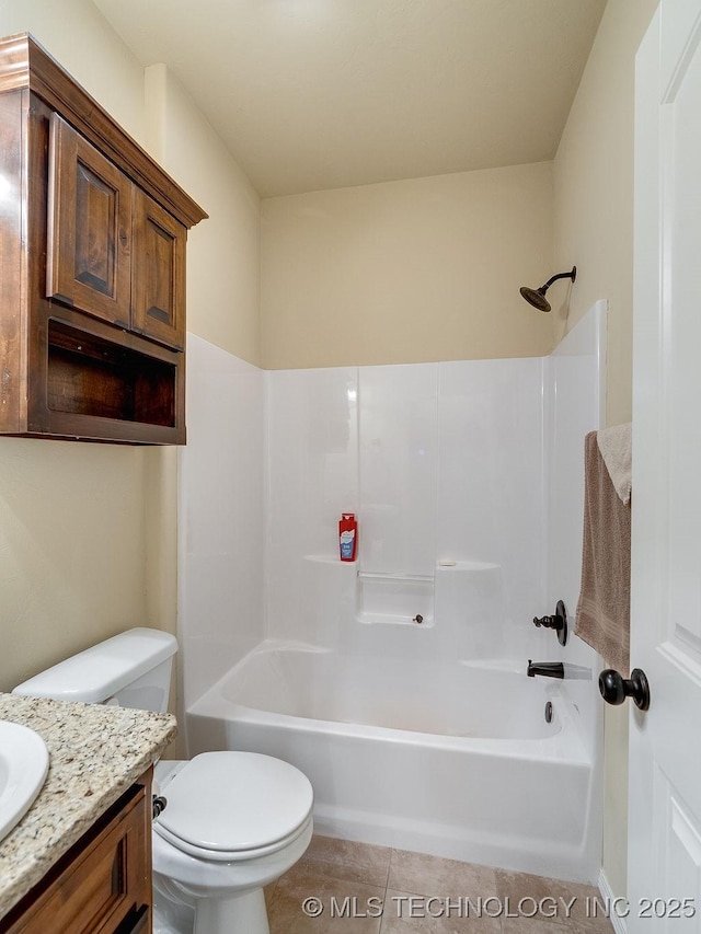 1125 Emily Ln, Ada, OK 74820 - bathroom featuring vanity, tile patterned flooring, and bathing tub / shower combination