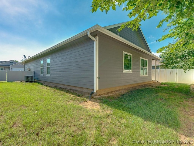 1125 Emily Ln, Ada, OK 74820 - view of side of property featuring a central AC unit