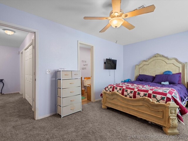 5229 Nowata Rd Unit F101, Bartlesville, OK 74006 - bedroom with carpet flooring, ensuite bathroom, and a ceiling fan