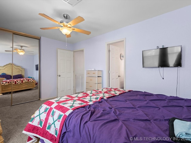 5229 Nowata Rd Unit F101, Bartlesville, OK 74006 - carpeted bedroom featuring a closet and ceiling fan