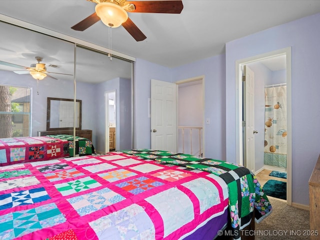 5229 Nowata Rd Unit F101, Bartlesville, OK 74006 - bedroom with a ceiling fan, a closet, carpet floors, and connected bathroom