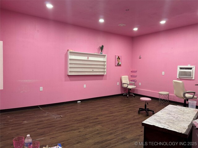 9763 E 3rd St, Tulsa, OK 74128 - miscellaneous room featuring dark wood-style flooring, a wall unit AC, and recessed lighting