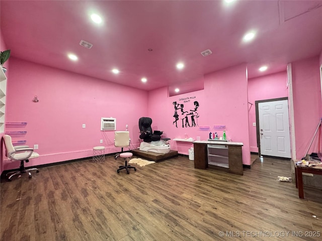 9763 E 3rd St, Tulsa, OK 74128 - exercise area with dark wood-style flooring, a wall mounted air conditioner, and recessed lighting