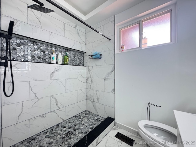 9763 E 3rd St, Tulsa, OK 74128 - bathroom featuring marble look tile flooring and a tile shower