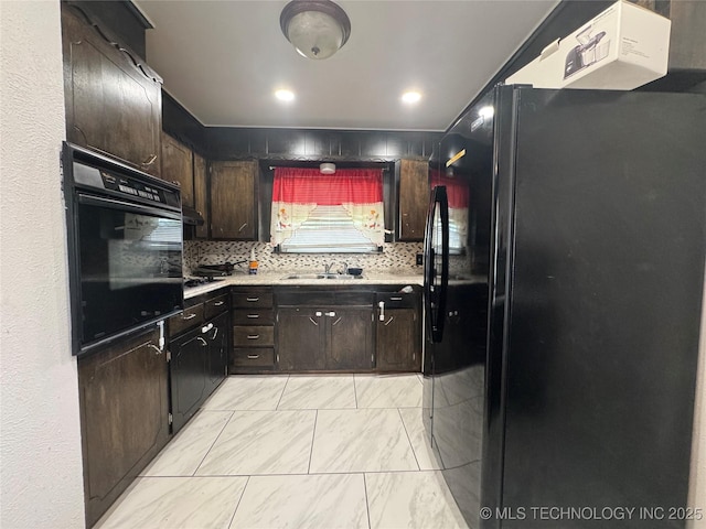9763 E 3rd St, Tulsa, OK 74128 - kitchen featuring black appliances, light countertops, light marble finish flooring, and dark brown cabinetry
