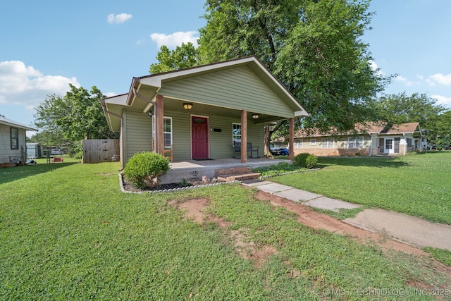 236 W 9th Ave, Bristow, OK 74010 - bungalow-style house with a porch and a front yard