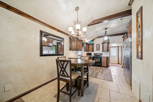 236 W 9th Ave, Bristow, OK 74010 - dining space with a textured wall, lofted ceiling, a chandelier, light tile patterned floors, and ornamental molding