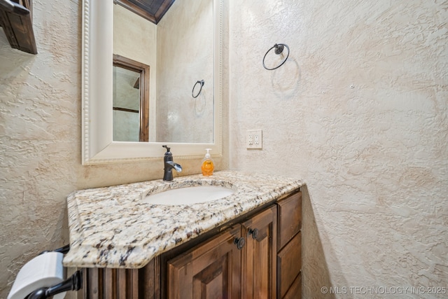 236 W 9th Ave, Bristow, OK 74010 - bathroom with a textured wall and vanity