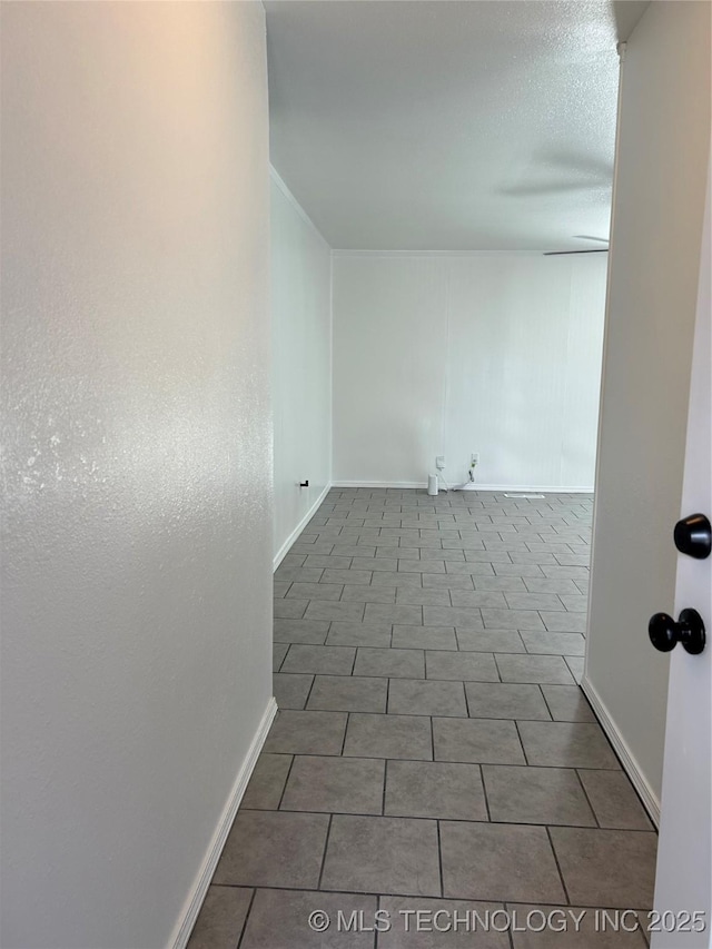 12976 E 32nd St, Tulsa, OK 74134 - empty room with baseboards and tile patterned floors