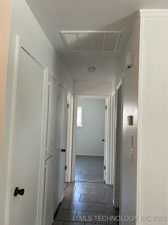 12976 E 32nd St, Tulsa, OK 74134 - hall with tile patterned floors